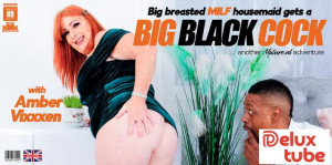 British Amber Vixxxen is a curvy big breasted MILF with a taste for a hard black cock