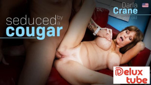 American MILF Darla Crane seduces a young man to fuck her wild at her house!